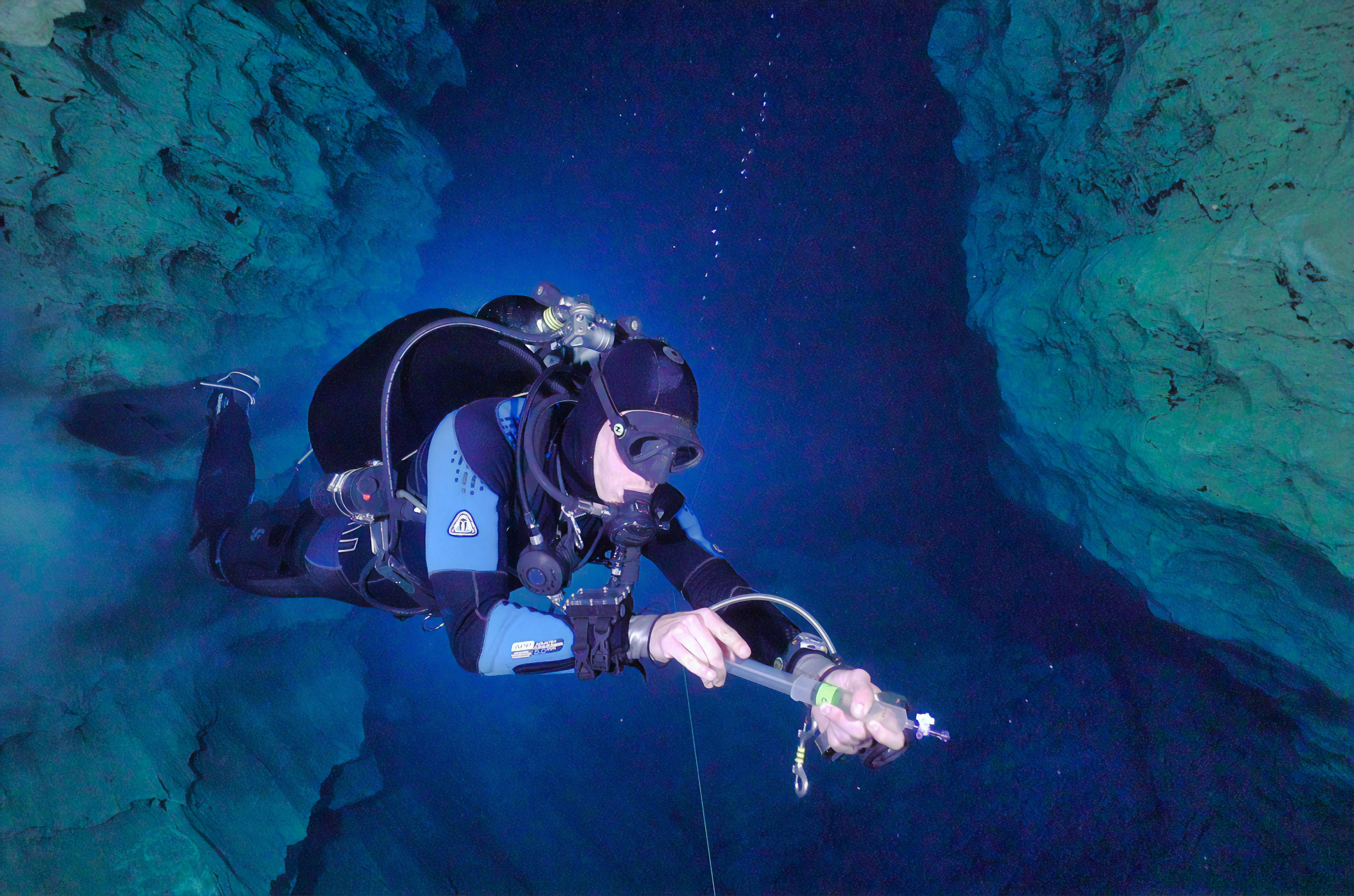 man diving in water